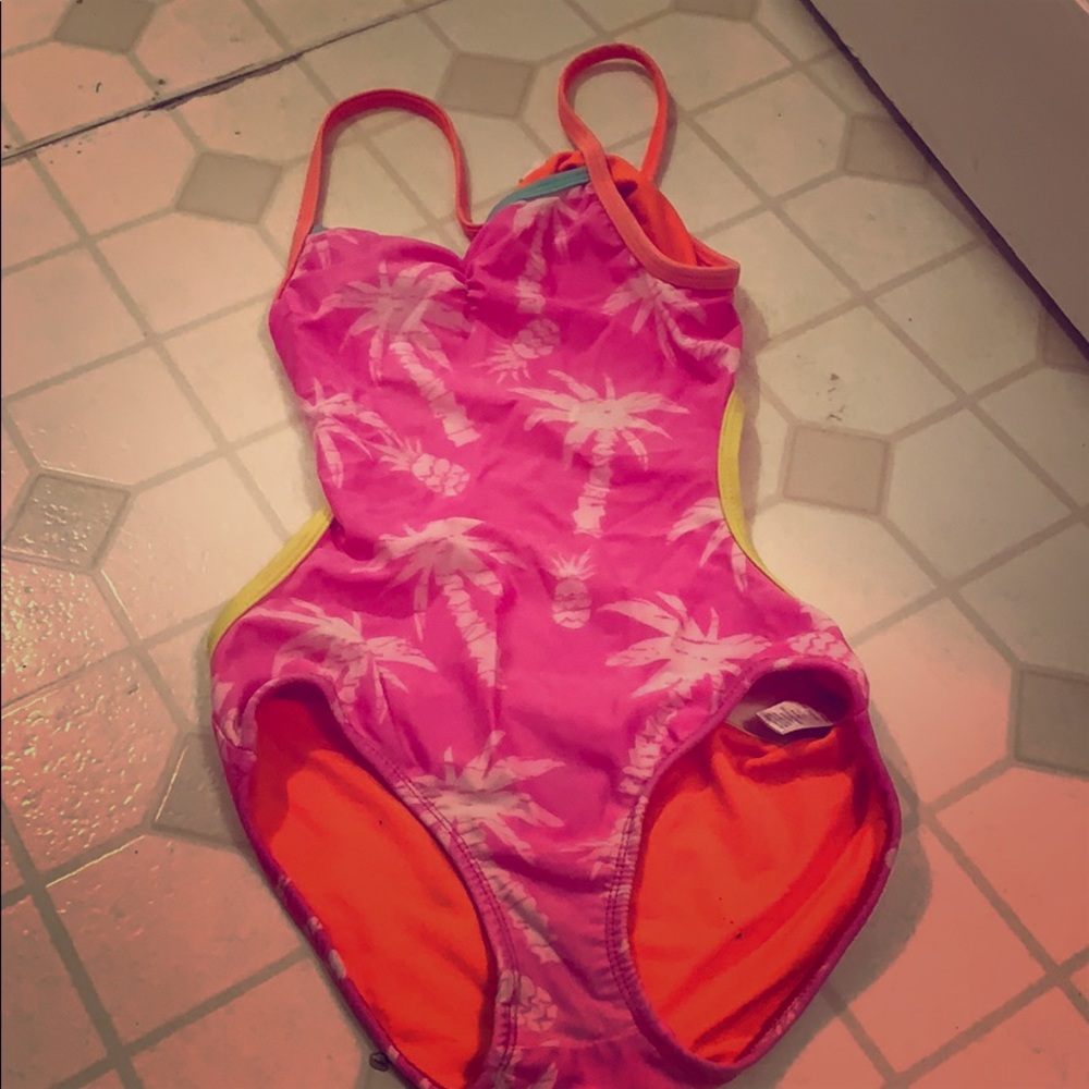 Pink,bathing suit with palm from’s and pineapple